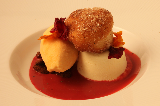 ENCHANTING Ricotta Fritter, Carrot Ice Cream: Warm little “doughnut” filled with homemade goat’s milk ricotta, caramelized carrot ice cream, Nichols Farm sweet beet crema, frozen sabayon, cocoa-dusted walnuts 